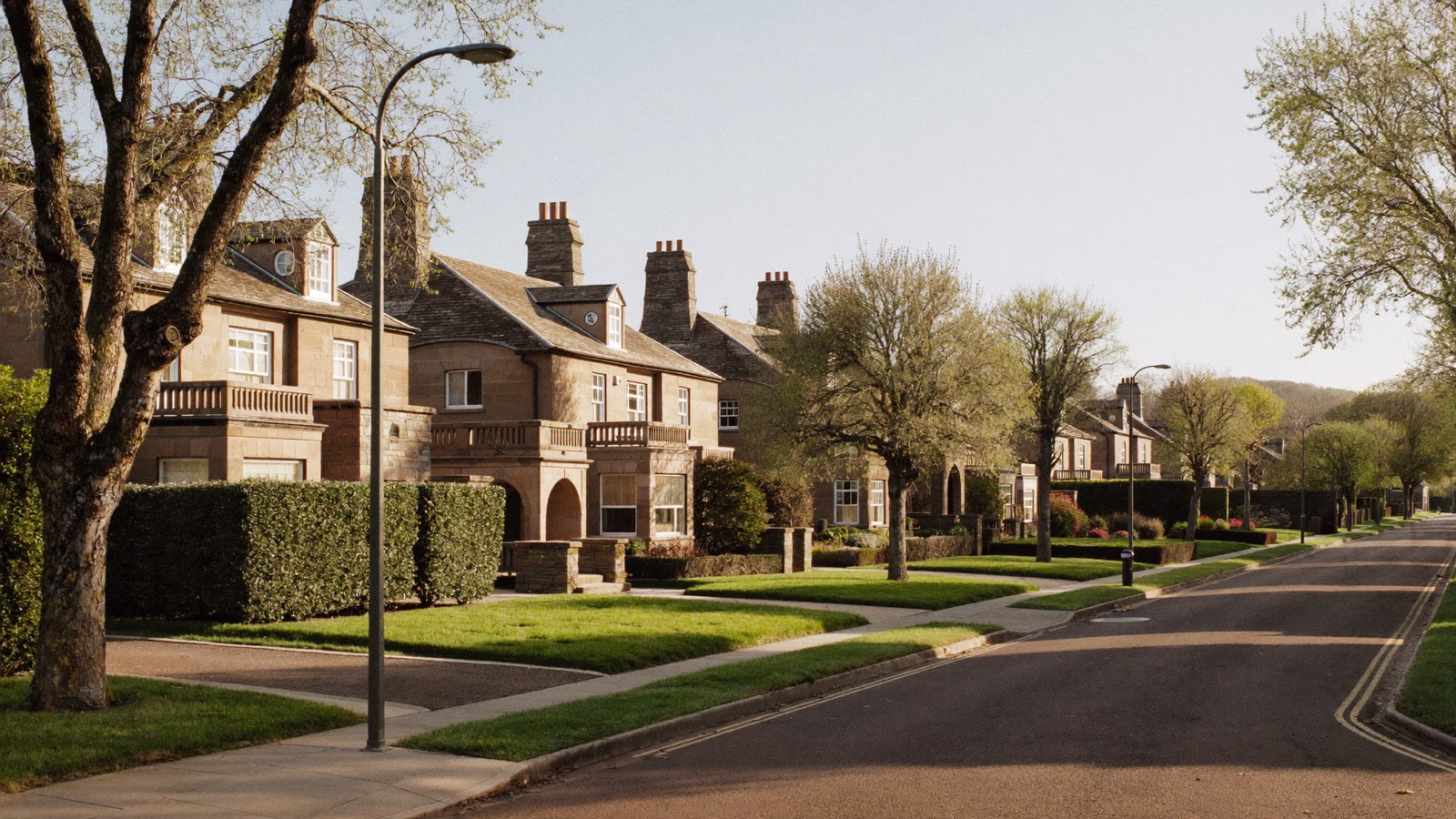 A leafy residential street in Newton Mearns on a spring morning